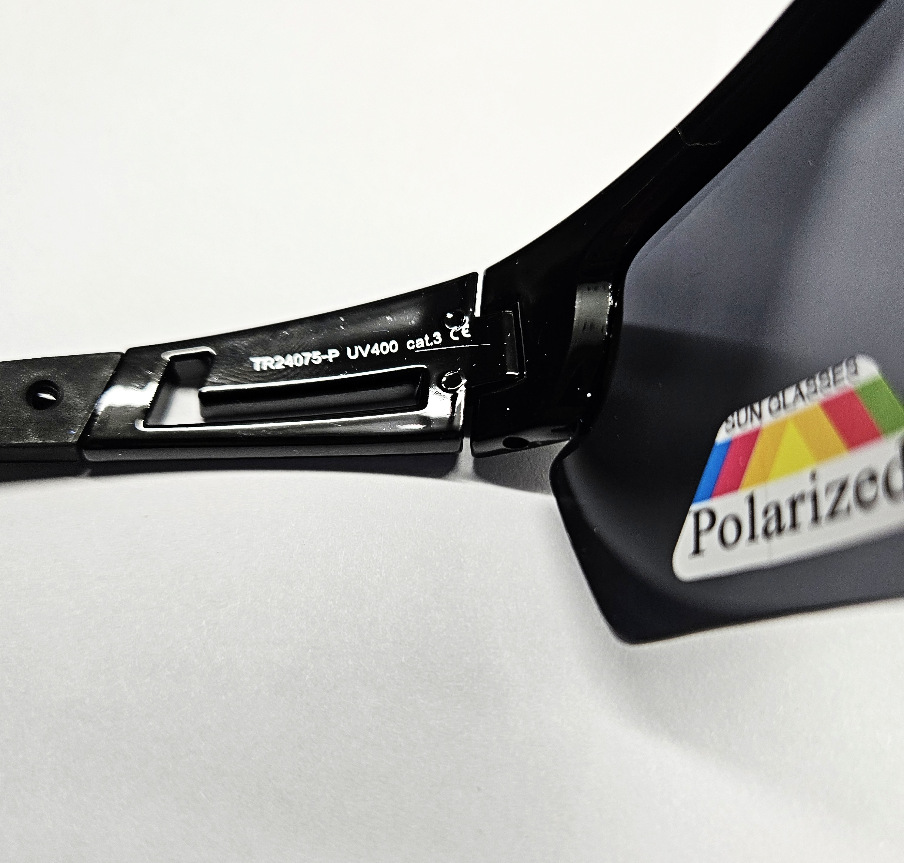 Polarizační brýle Qiim Sport TR24075P - šedé, plastové černé rámečky, UV 400 cat. 3